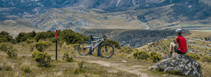person looking over an impressive mountain view